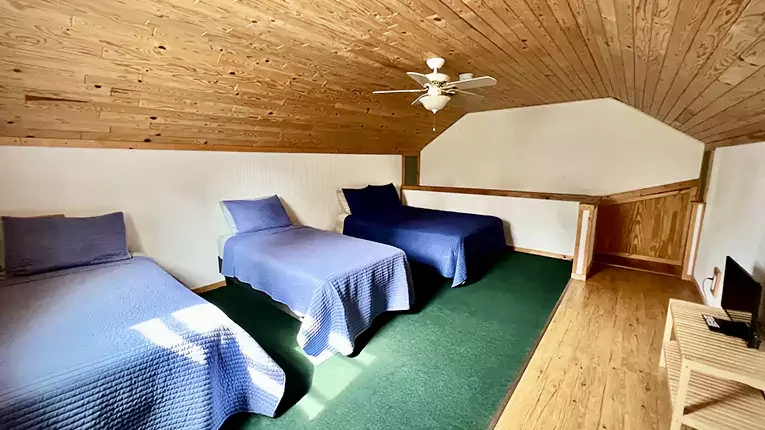 Loft Bedroom - Wolf Lake Lodge Rental Cabin